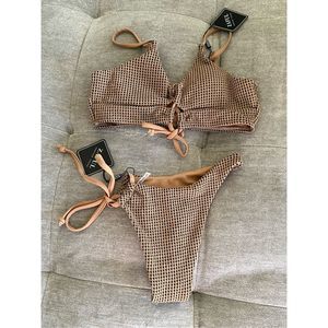 Texture tanking asymmetrical bottom and lace up top NWT